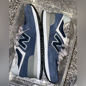 New Balance 574 women’s 6.5 men’s 5 Blue and gray